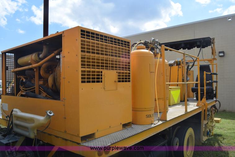 image for item K6534 1994 GMC W5 paint striper truck