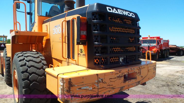 image for item L2020 Daewoo MG300V wheel loader