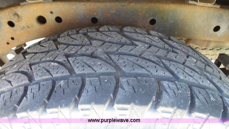 image for item L4797 2002 Nissan Frontier SE Crew Cab pickup truck