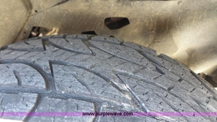 image for item L4797 2002 Nissan Frontier SE Crew Cab pickup truck