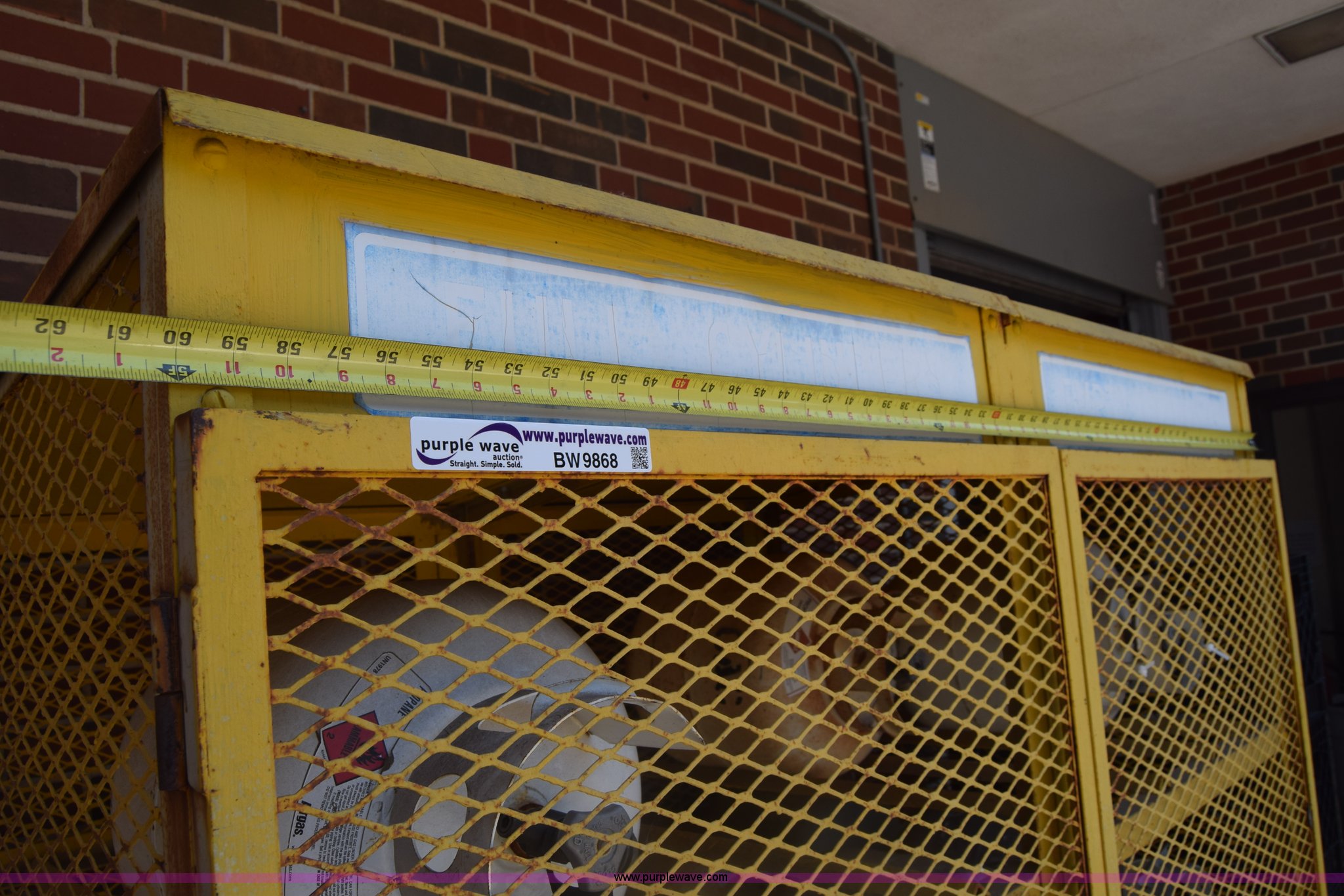 Propane tank cage in Wichita, KS Item BW9868 sold Purple Wave