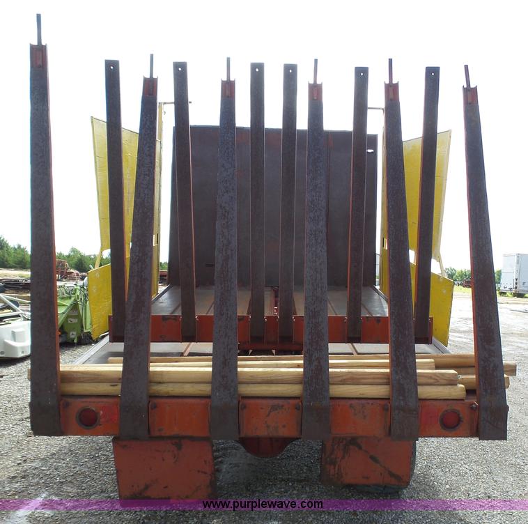 image for item J6058 New Holland 1049 Stackcruiser bale wagon