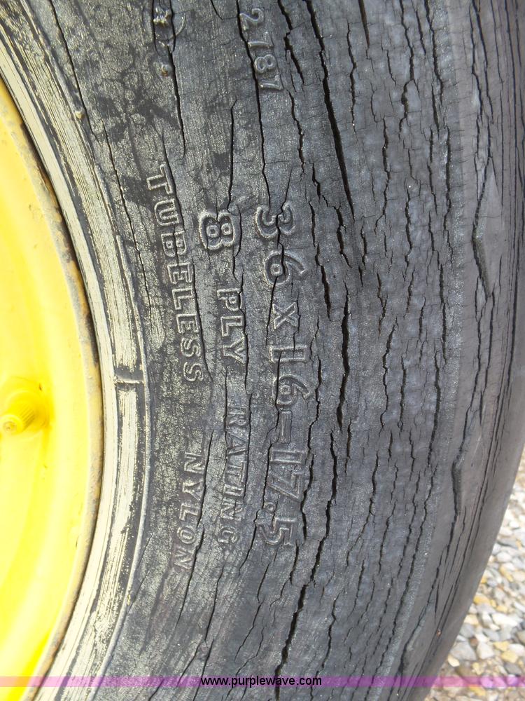 image for item J6058 New Holland 1049 Stackcruiser bale wagon