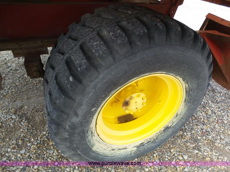 image for item J6058 New Holland 1049 Stackcruiser bale wagon