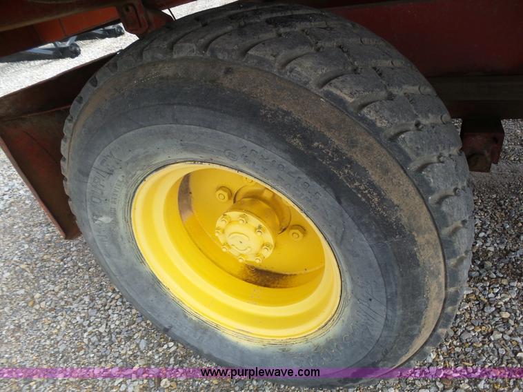 image for item J6058 New Holland 1049 Stackcruiser bale wagon