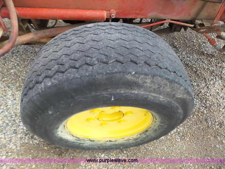 image for item J6058 New Holland 1049 Stackcruiser bale wagon