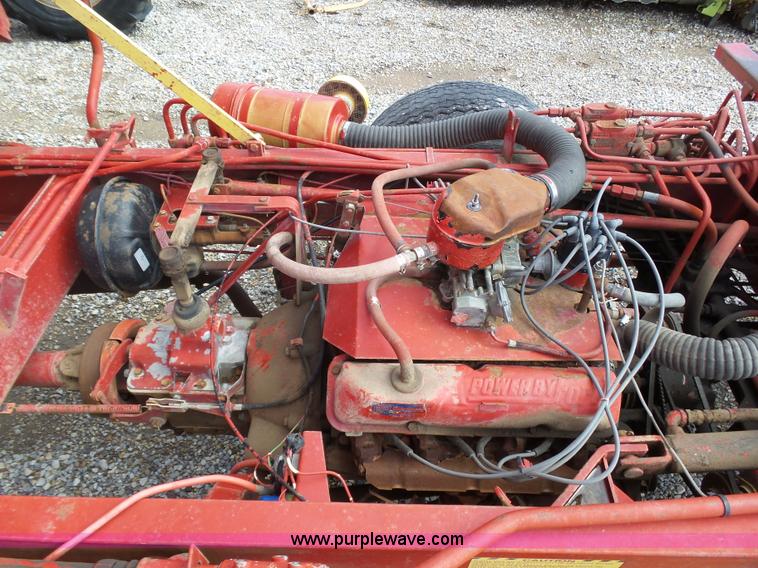 image for item J6058 New Holland 1049 Stackcruiser bale wagon