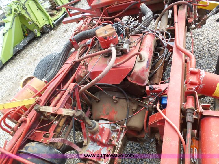 image for item J6058 New Holland 1049 Stackcruiser bale wagon