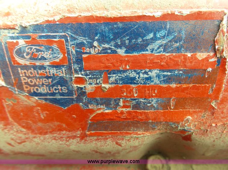 image for item J6058 New Holland 1049 Stackcruiser bale wagon