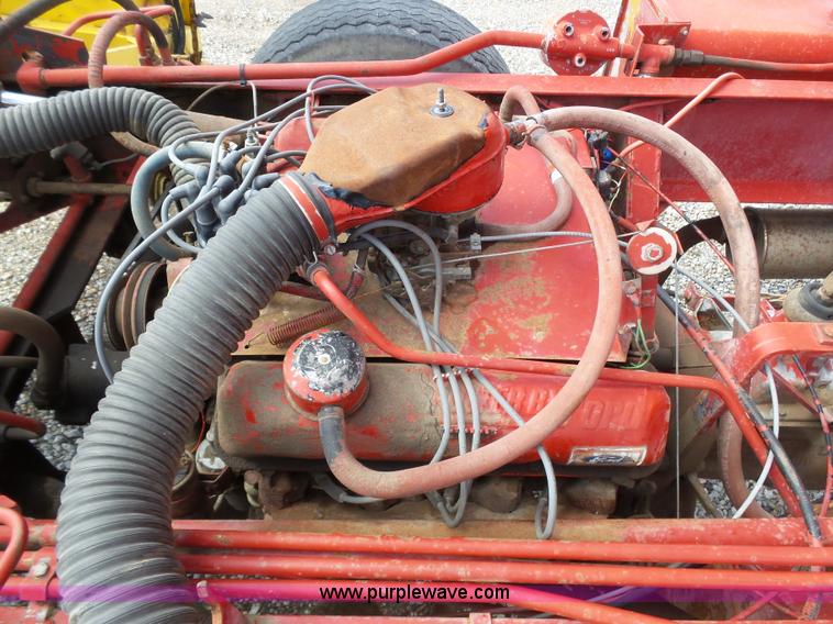 image for item J6058 New Holland 1049 Stackcruiser bale wagon