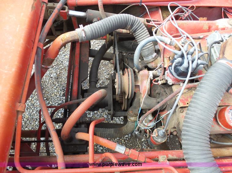 image for item J6058 New Holland 1049 Stackcruiser bale wagon