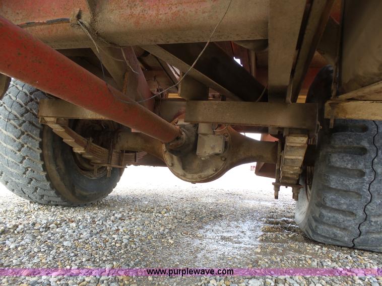 image for item J6058 New Holland 1049 Stackcruiser bale wagon