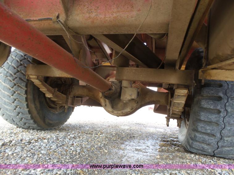 image for item J6058 New Holland 1049 Stackcruiser bale wagon