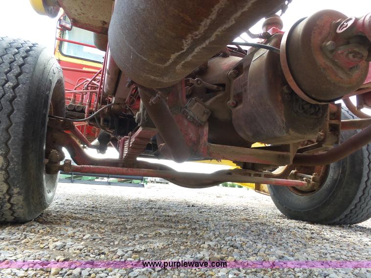 image for item J6058 New Holland 1049 Stackcruiser bale wagon