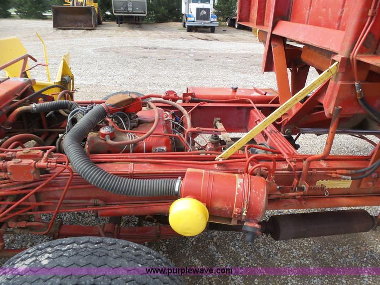 image for item J6058 New Holland 1049 Stackcruiser bale wagon