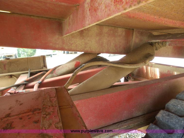 image for item J6058 New Holland 1049 Stackcruiser bale wagon