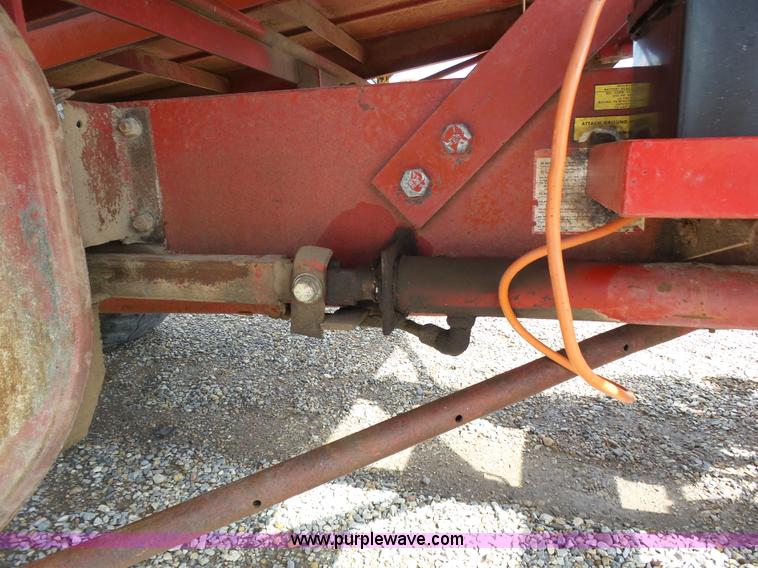 image for item J6058 New Holland 1049 Stackcruiser bale wagon