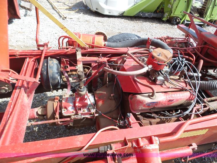 image for item J6058 New Holland 1049 Stackcruiser bale wagon