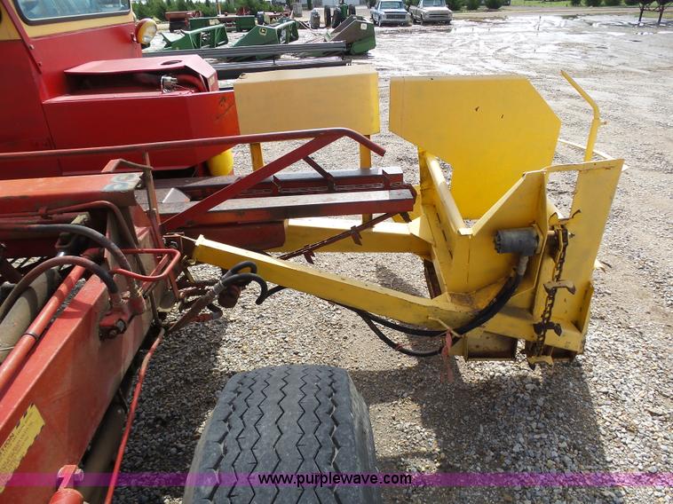 image for item J6058 New Holland 1049 Stackcruiser bale wagon