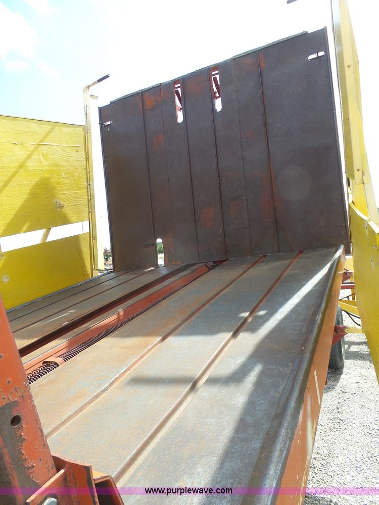 image for item J6058 New Holland 1049 Stackcruiser bale wagon