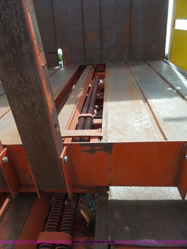 image for item J6058 New Holland 1049 Stackcruiser bale wagon