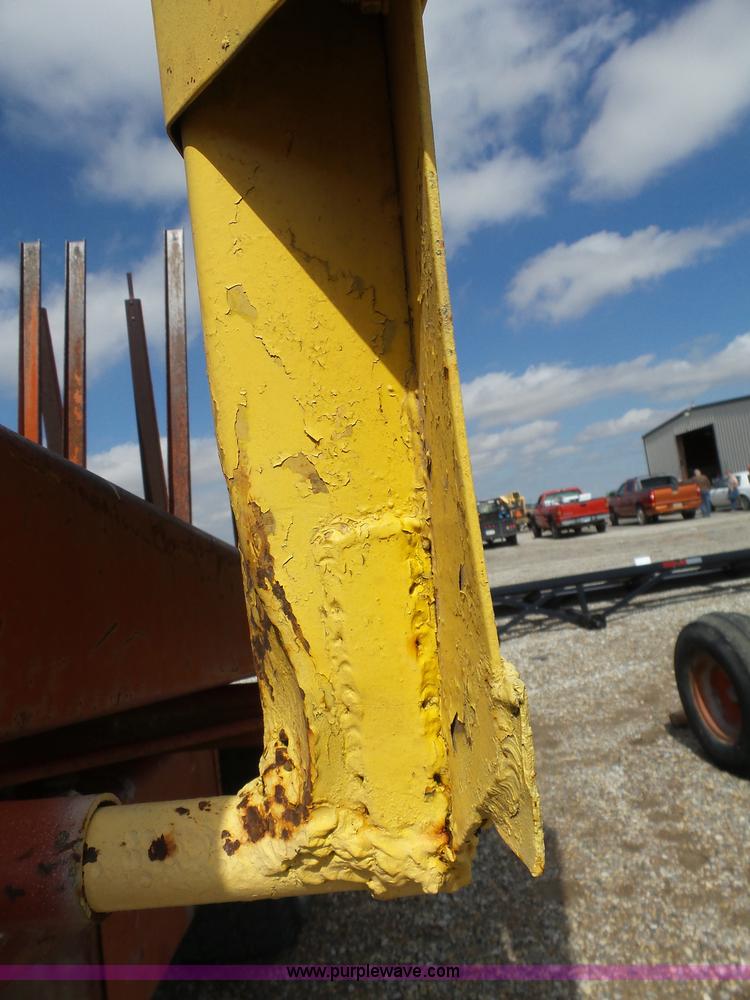 image for item J6058 New Holland 1049 Stackcruiser bale wagon