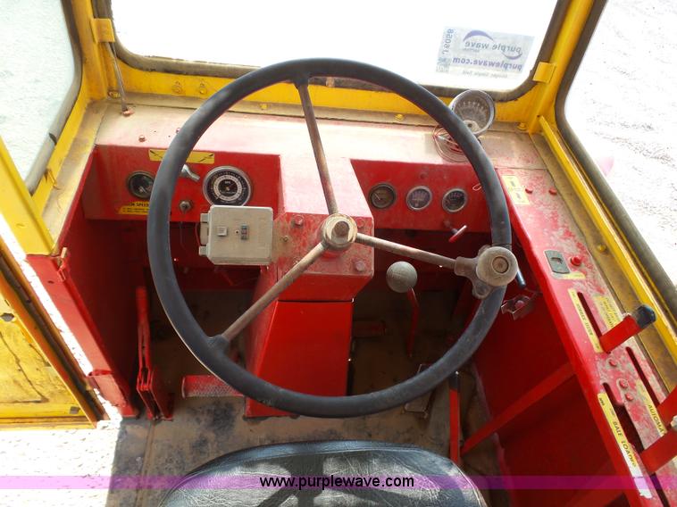 image for item J6058 New Holland 1049 Stackcruiser bale wagon