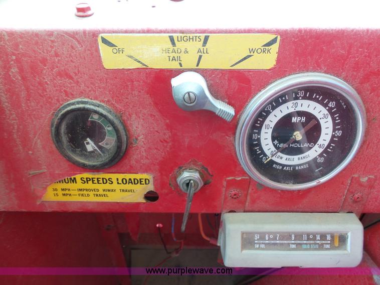 image for item J6058 New Holland 1049 Stackcruiser bale wagon