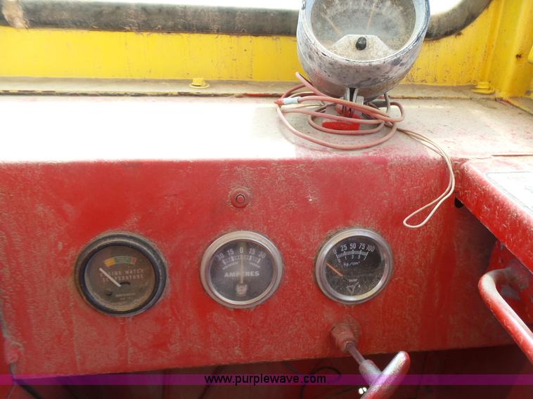 image for item J6058 New Holland 1049 Stackcruiser bale wagon