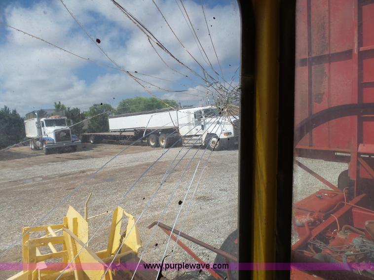 image for item J6058 New Holland 1049 Stackcruiser bale wagon