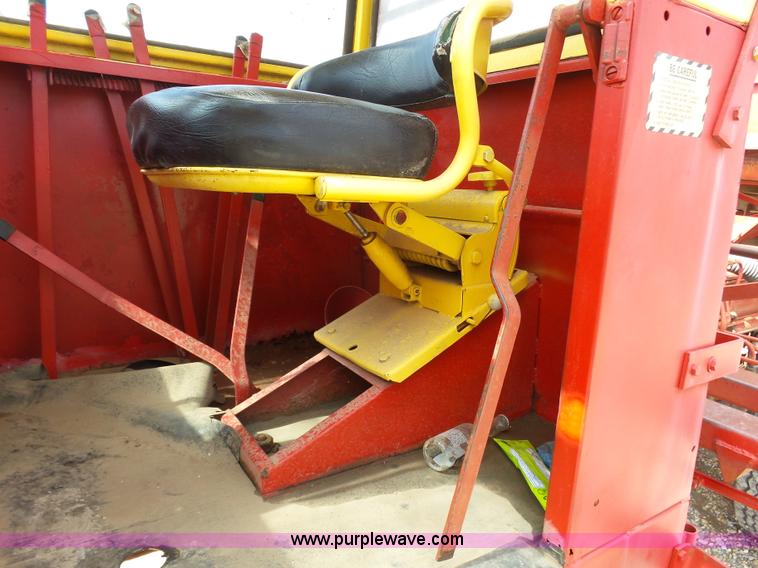 image for item J6058 New Holland 1049 Stackcruiser bale wagon