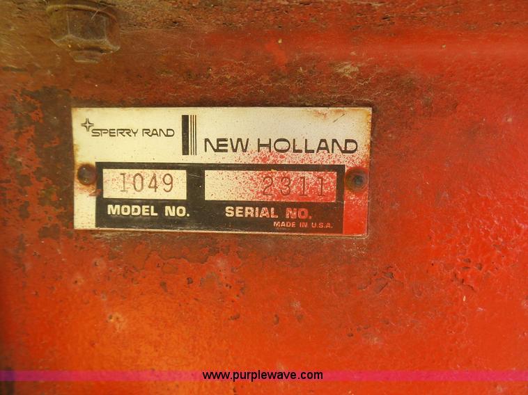 image for item J6058 New Holland 1049 Stackcruiser bale wagon