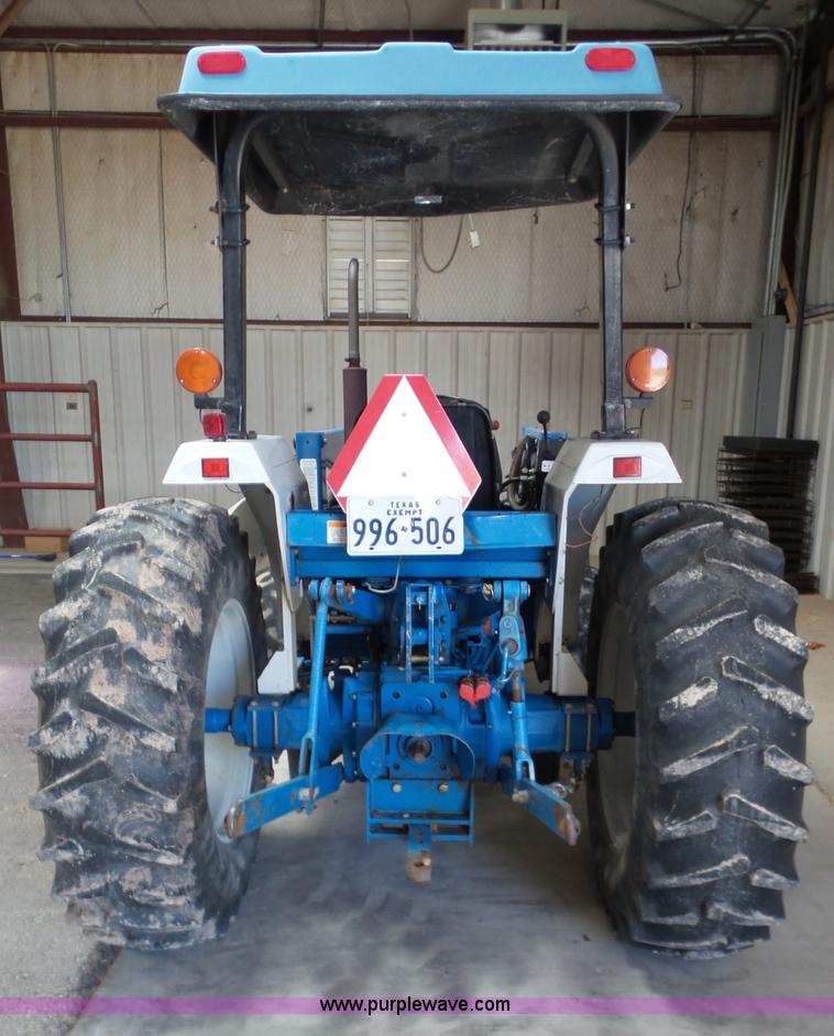 image for item L6590 1998 New Holland 2120 MFWD tractor