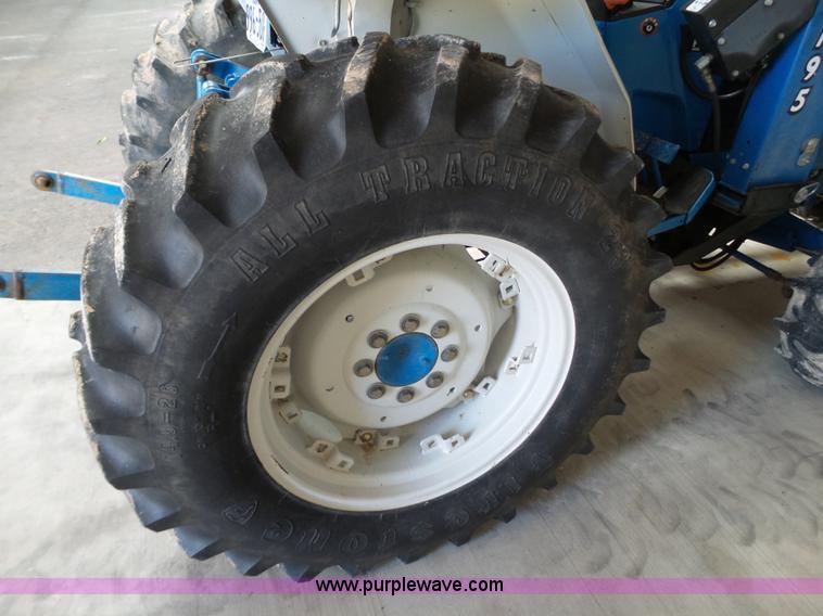 image for item L6590 1998 New Holland 2120 MFWD tractor