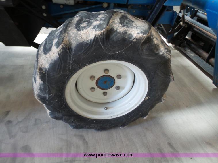 image for item L6590 1998 New Holland 2120 MFWD tractor