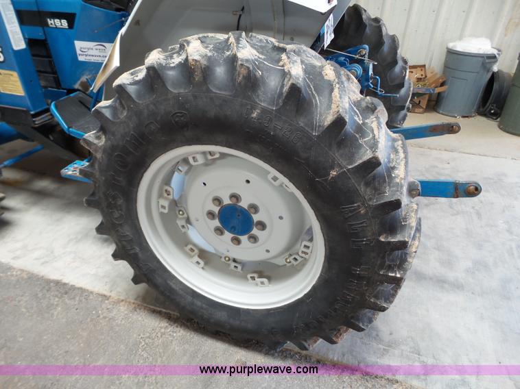 image for item L6590 1998 New Holland 2120 MFWD tractor