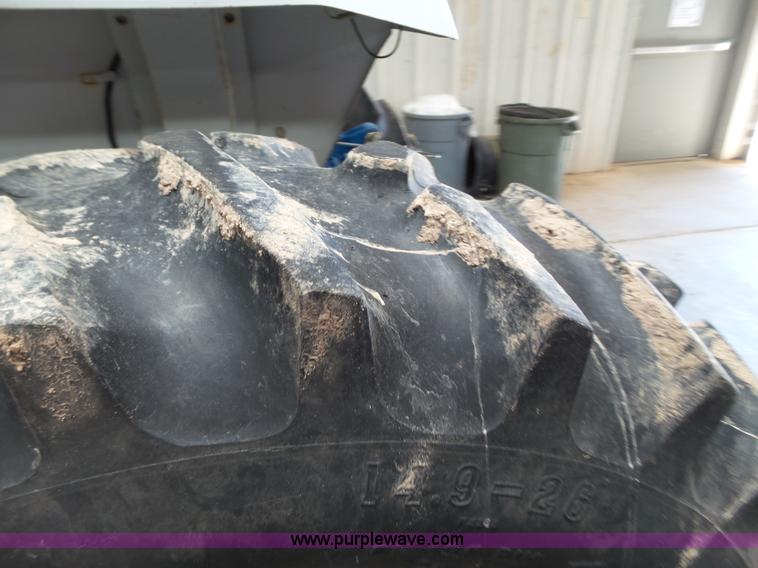 image for item L6590 1998 New Holland 2120 MFWD tractor