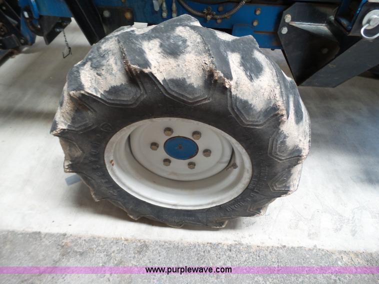 image for item L6590 1998 New Holland 2120 MFWD tractor