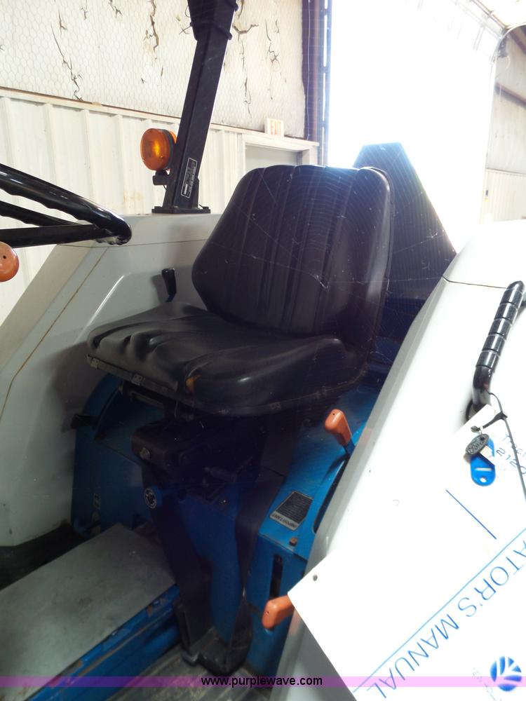 image for item L6590 1998 New Holland 2120 MFWD tractor