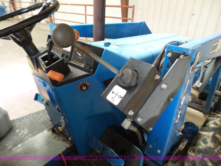 image for item L6590 1998 New Holland 2120 MFWD tractor