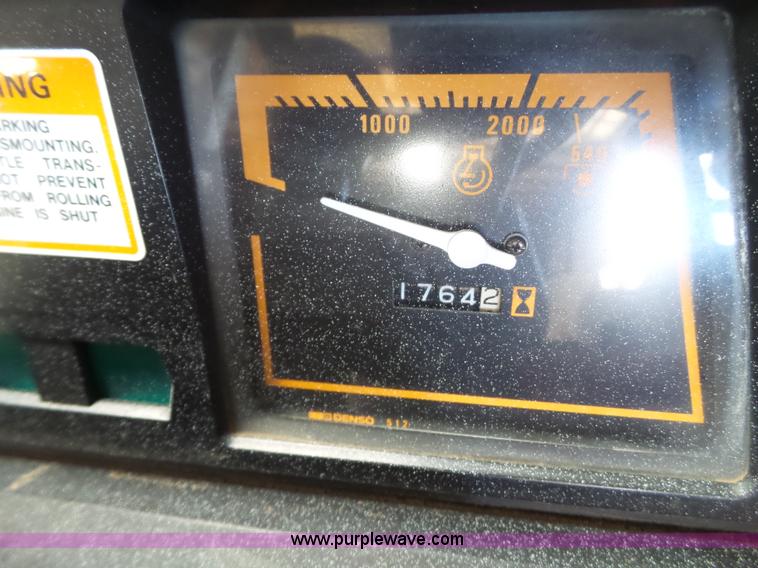 image for item L6590 1998 New Holland 2120 MFWD tractor