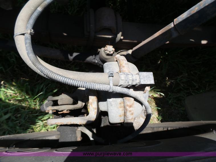 image for item J4911 2000 International 4700 dump truck