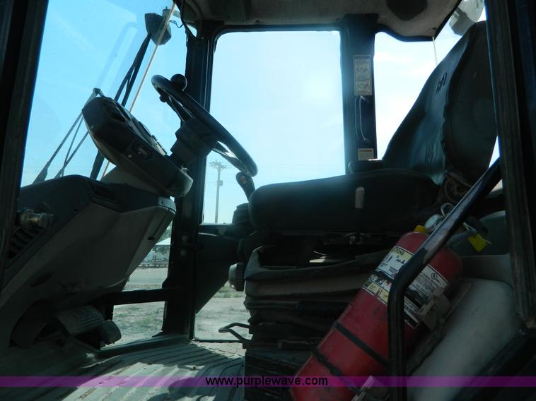 image for item J8881 1999 Caterpillar 906 wheel loader