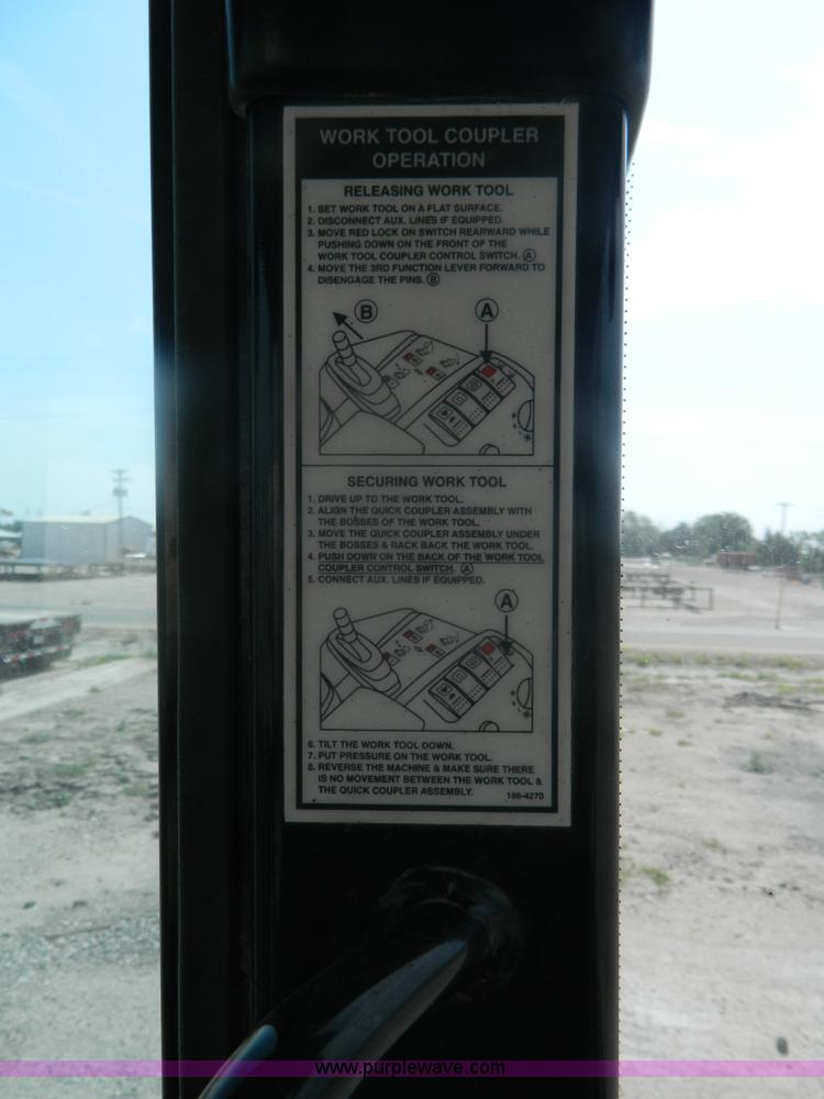 image for item J8881 1999 Caterpillar 906 wheel loader