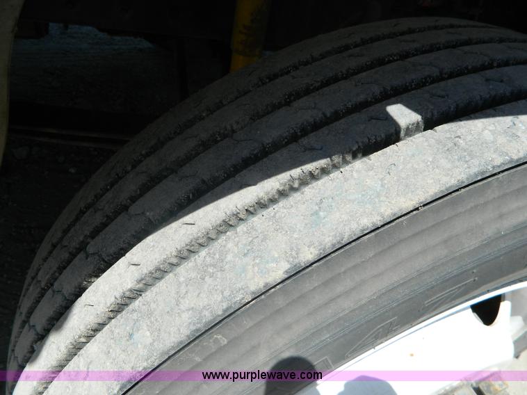 image for item J8899 2007 Freightliner Business Class M2 roll off truck