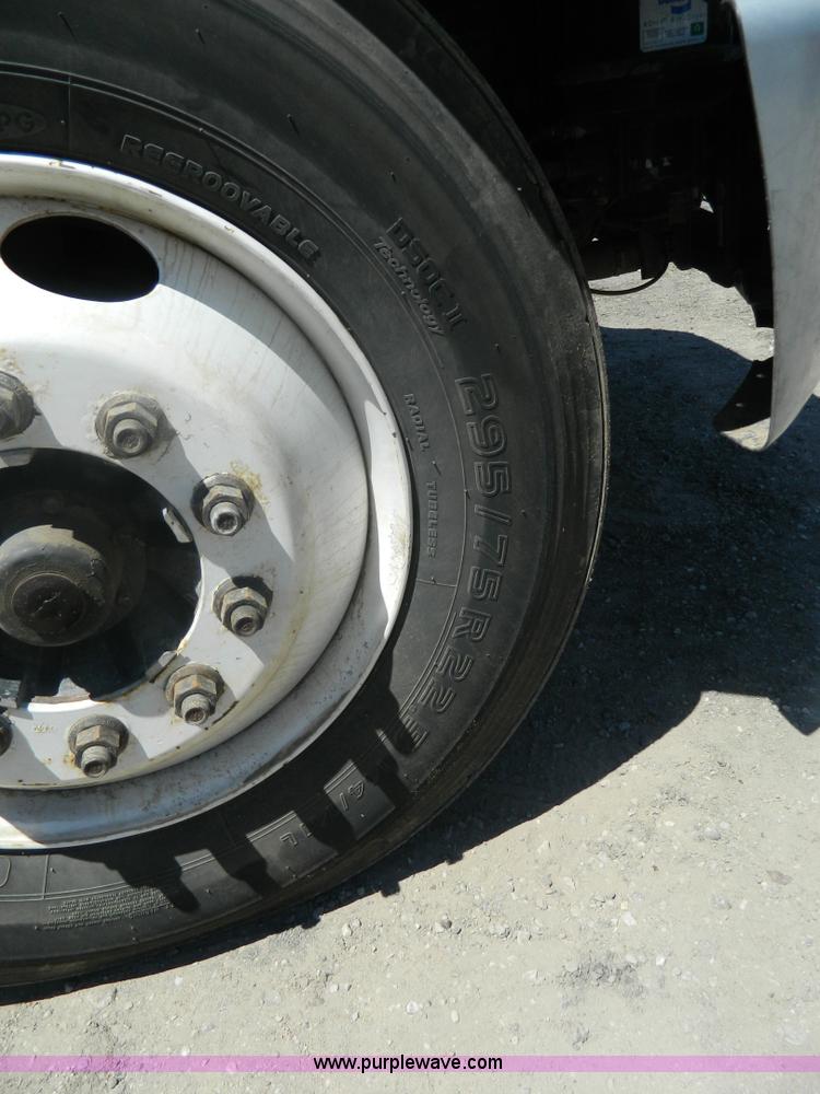 image for item J8899 2007 Freightliner Business Class M2 roll off truck