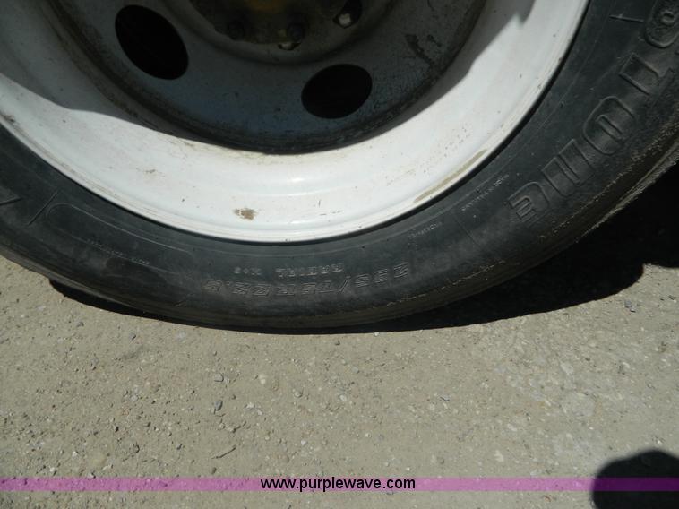 image for item J8899 2007 Freightliner Business Class M2 roll off truck