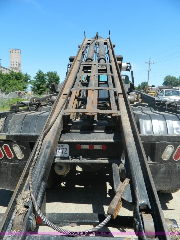 image for item J8899 2007 Freightliner Business Class M2 roll off truck