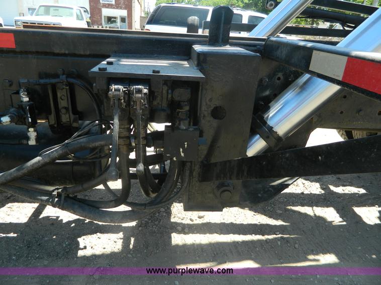 image for item J8899 2007 Freightliner Business Class M2 roll off truck