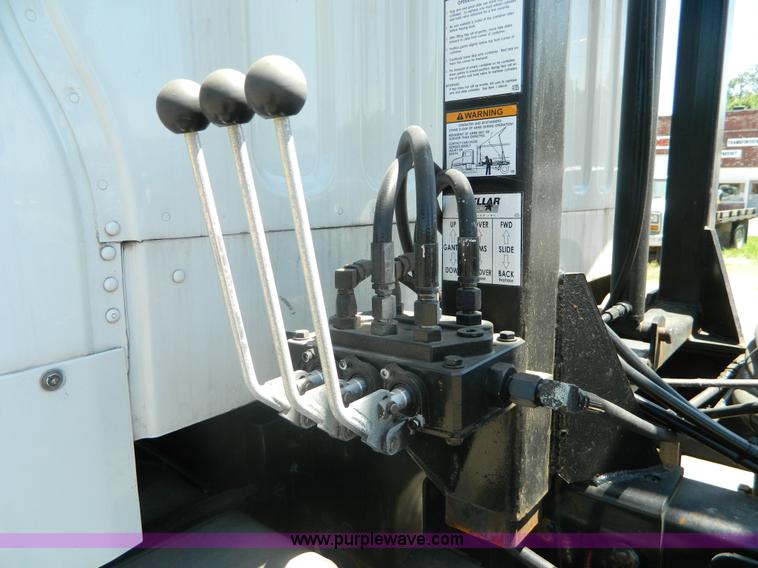 image for item J8899 2007 Freightliner Business Class M2 roll off truck